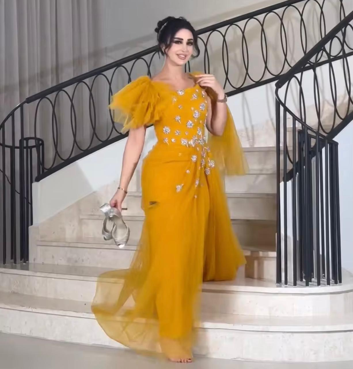Elegant mustard yellow tulle saree gown